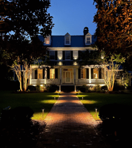 Nashville home illuminated with custom landscape lighting design
